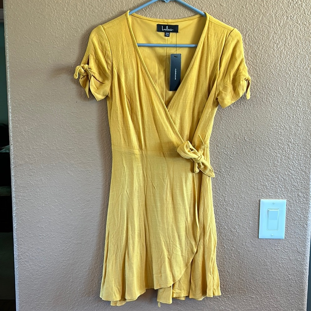 Golden yellow wrap dress